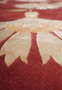 Close-up of the cotton foundation on a modern Tibetan rug, highlighting tight weaving structure and durability beneath the wool and silk surface