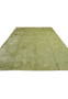 Laid-down view illustrating the full scale, soft color variation, and organic movement of this olive sage green area rug.