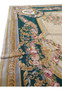 Side angle view of French Aubusson rug emphasizing flatwoven construction, floral border depth, beige field, and European decorative balance