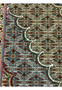 Close up of 11.5 x 16.5 Persian Tabriz Mahi 50 Raj rug showing dense repeating fish pattern with floral rosettes, fine knot structure, deep navy ground, and ivory detailing