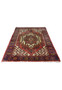 Small Persian Gholtogh tribal rug laid flat showing geometric medallion, ivory motifs, red field, and navy blue border