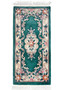 Full view of a 2'3 x 4'7 Aubusson Art Deco rug with emerald green field, ivory border, and raised floral scrollwork in soft pastel tones