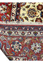 Backside view of a Persian Isfahan rug showing tight, uniform knots, clear pattern definition, and high-quality handwoven structure