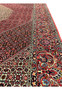 Edge detail of a Persian Bijar iron rug highlighting dense wool pile, straight selvedge, tight knotting, and exceptional structural integrity