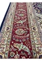 Close-up of the red and ivory border on an 11'2 x 14'4 Persian Tabriz rug with detailed floral motifs and fine craftsmanship