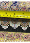 Measured backside view of a signed Persian Qum pure silk rug showing fine weave density and knot precision