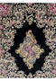 Close-up of the central medallion on a signed Persian Qum silk rug with gold scrollwork and rose floral details