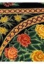 Floral motif close-up of a signed Persian Qum pure silk rug showing layered roses in red and gold tones against a black ground with crisp silk detail