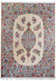 Straight-on image of a hand-knotted Persian Kerman rug featuring an ivory background, floral medallion, pastel pink flowers, and blue vine motifs
