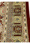 Zoomed border detail of signed Amjadi Persian Qum silk rug highlighting architectural motifs, floral accents, and precision silk knotting