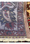Backside view of a Persian Bakhtiar rug showing tight knotting, consistent weave, clear garden panel layout, and strong wool foundation