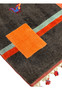 Edge detail of Persian Gabbeh rug displaying clean finishing, sturdy binding, and plush wool pile construction