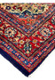 Edge binding and fringe detail Persian Mahal rug showing navy selvage red border and white cotton fringe