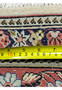 Zoomed backside of Persian Bijar rug with measuring tape showing tight knot density and compact weave