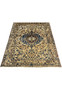 Laid down angle of oversized Persian Heriz rug in navy and ivory displaying geometric medallion and wide tribal border design