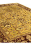 Midfield section of handmade gold Indian Agra rug showing dense floral lattice pattern with wine red and sage green detailing