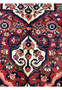 Floral motif detail of vintage hand-knotted Persian Bakhtiari rug with palmette and rosette patterns.