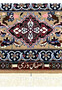 Zoomed Darri weaver signature Persian Isfahan rug woven in Persian script navy border authentication mark