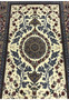 Midfield detail Persian Isfahan wool silk rug blue cornflower sprays pink peonies ivory ground Darri