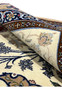 Foundation closeup Persian Isfahan wool silk rug folded edge showing cotton base pile thickness navy border