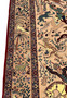 Zoomed border detail of 5x8 Persian Isfahan Seirafian rug with deer, goat and palm motifs
