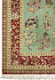 3x5 Persian Qum pure silk rug signed Motevasel side border crimson floral vine celadon field detail