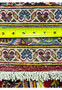 10x14'7 Persian Kashan rug featured on Shark Tank backside ruler knot density KPSI measurement
