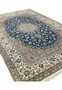 7x11 antique Persian Nain 9La rug angled view hand-knotted wool silk navy ivory floral
