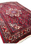 3x5 Persian Koliai tribal rug angled view thick tribal wool red ivory navy floral