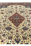 9x13 Persian Sarough rug field detail ivory ground floral vines rust navy medallion