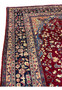 10x13 distressed antique Persian Mashad rug upper edge border red field transition detail