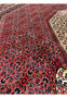 Red field closeup with diamond Herati lattice, 10x13 handmade Persian rug for dining room