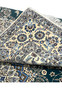 Folded edge revealing the flexibility and tight hand-knotted construction of this 600 KPSI Nain rug