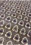 Midfield closeup with ivory cartouches sage green ground and miniature floral bouquets in pure kork wool