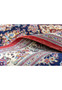 Backside of hand-knotted Persian Qum kork rug showing fine senneh knot and clean cotton foundation
