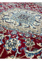 Foundation close-up of Persian Nain rug revealing tight hand knotted structure and fine wool and silk weave