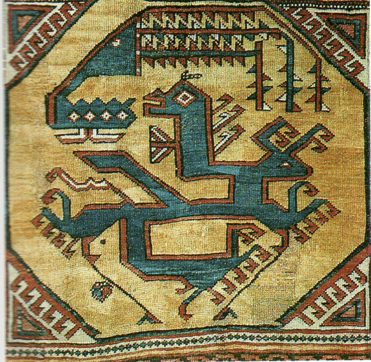 A Caucasian dragon rug detail with stylized confronting dragons among foliage