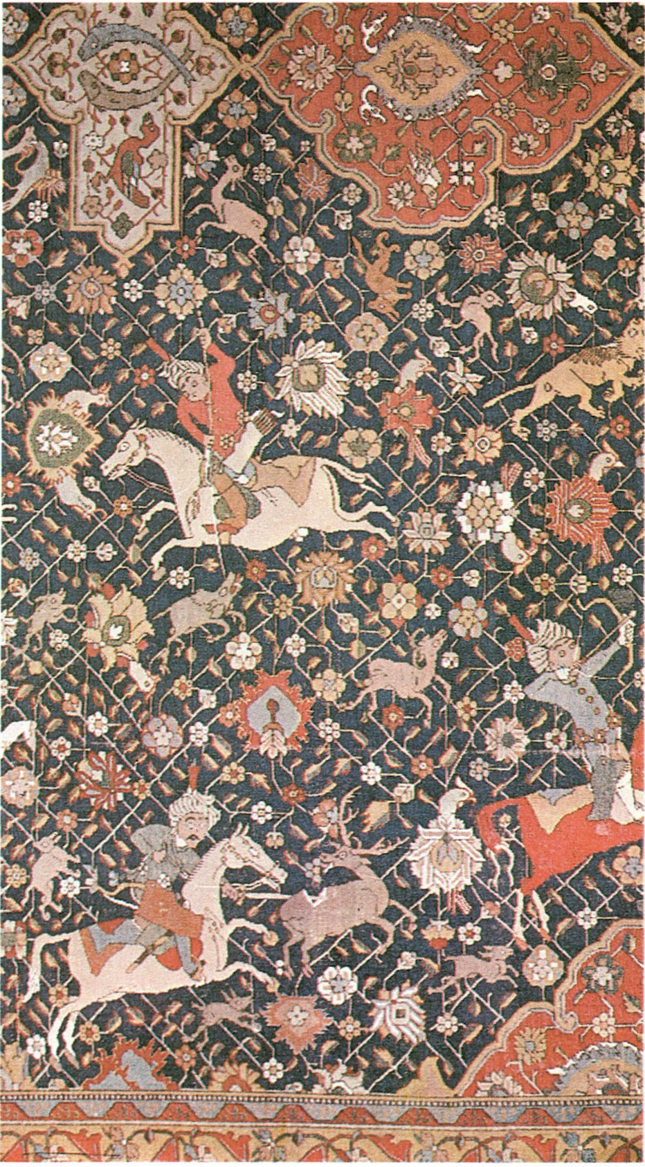 Detail of a hunting rug with an armed rider pursuing prey among flowers