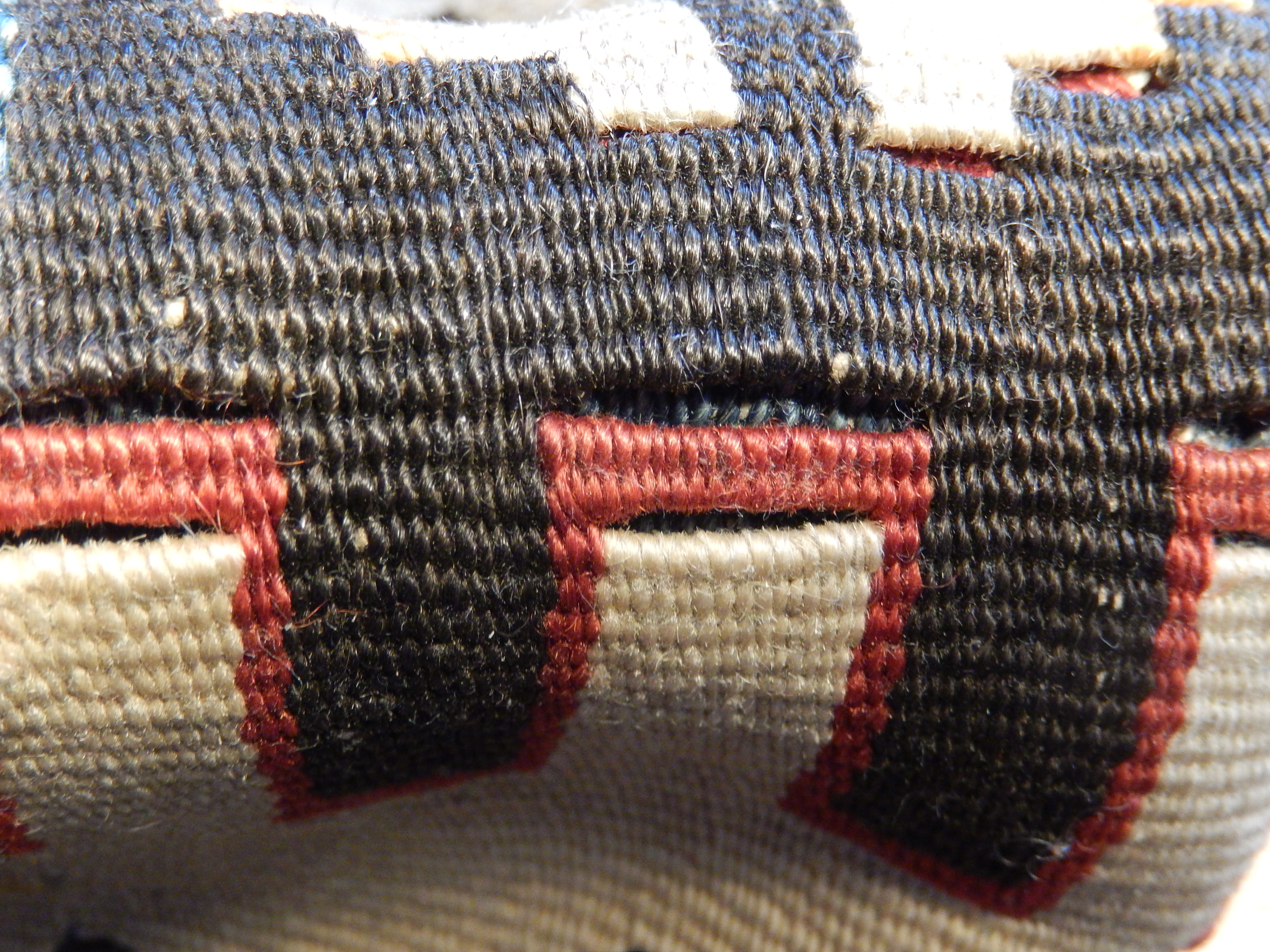 Close-up of kilim flat weave construction showing slit tapestry weft-faced technique