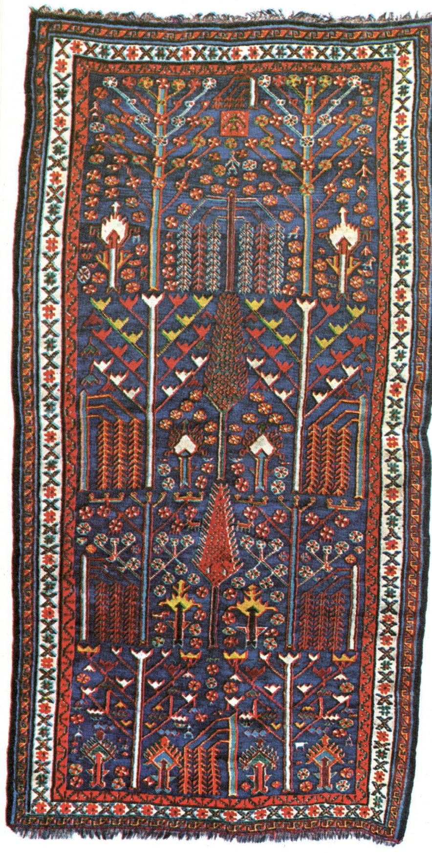 A Lori nomad rug with stylized floral and tree patterning, Persia, late 19th century