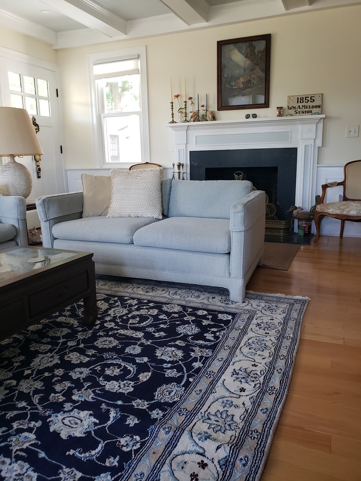 Customer photo of navy and ivory Persian rug delivered to a happy Rugs.net buyer