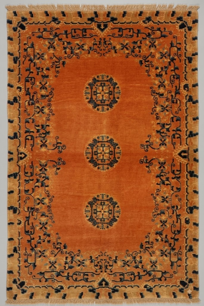 Orange Chinese rug with 3 stacked medallions from the end of the 19th century
