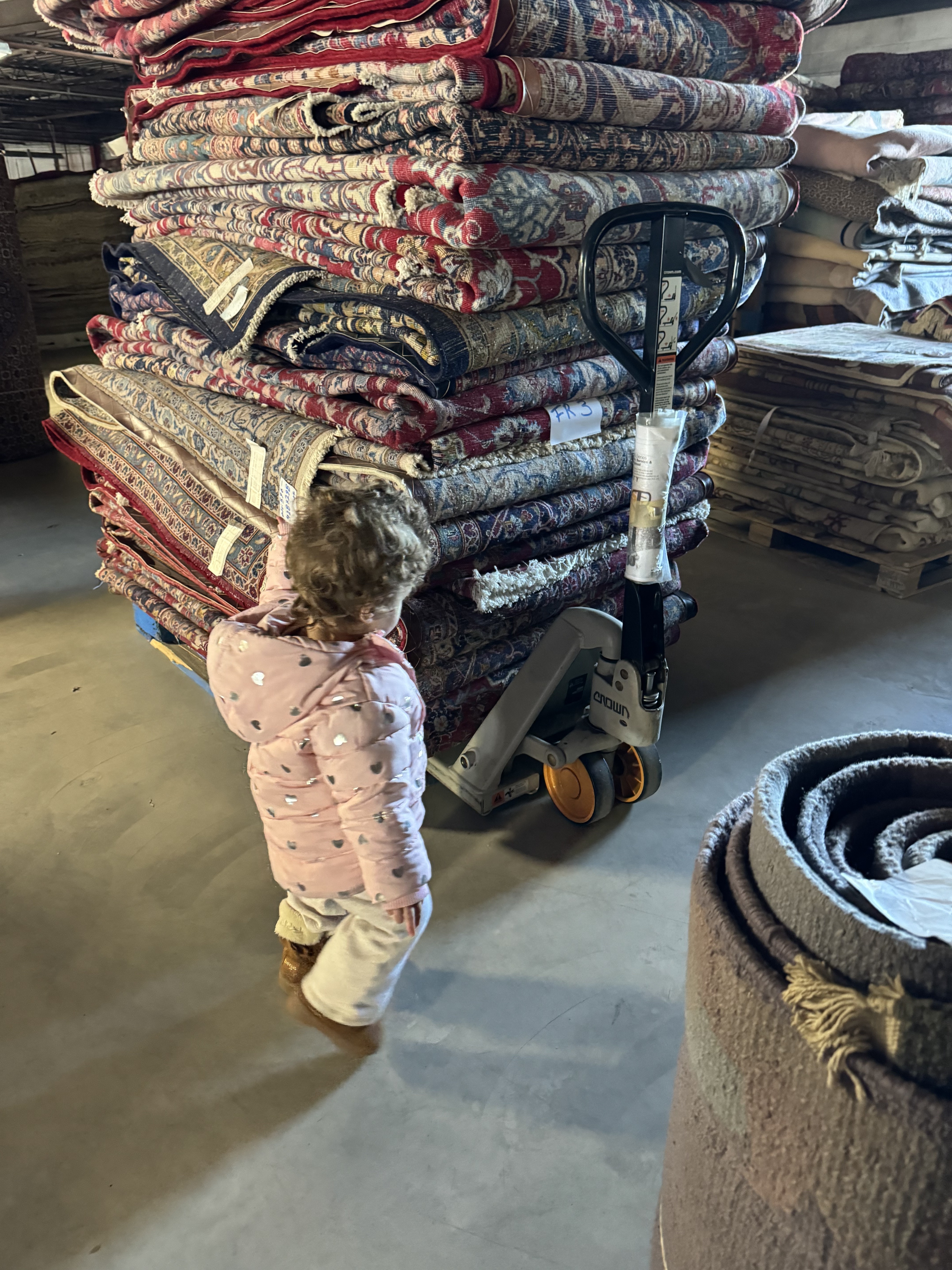 Quality inspection at Rugs.net, a family-run Persian rug business in Freeport, New York