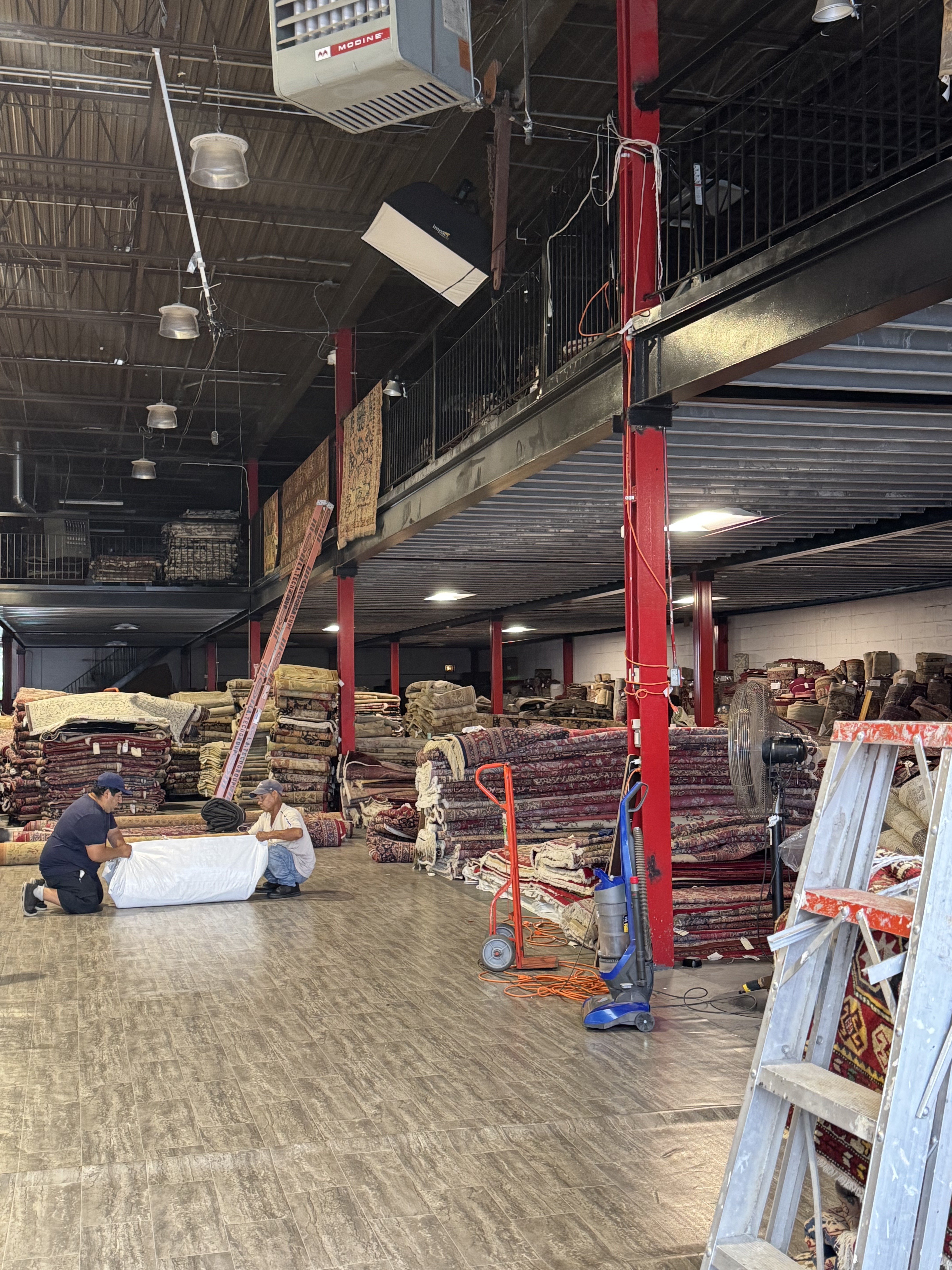 Inside the Rugs.net warehouse and headquarters in Freeport, NY with hand-knotted Persian rugs