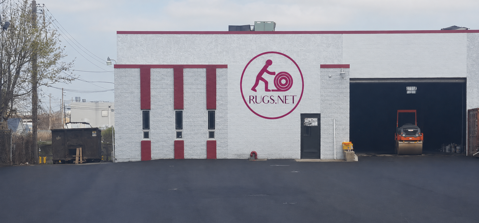 The Rugs.net headquarters and warehouse building in Freeport, New York at 371 South Main Street