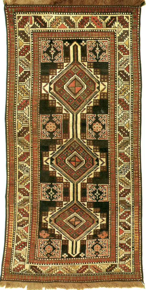 A Caucasian Shirvan rug with three medallions down the central field