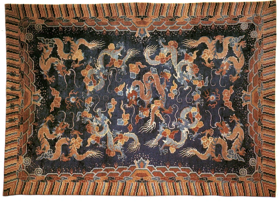 Antique 18th century Chinese silk rug with dragons playing with the flaming pearl on dark blue field