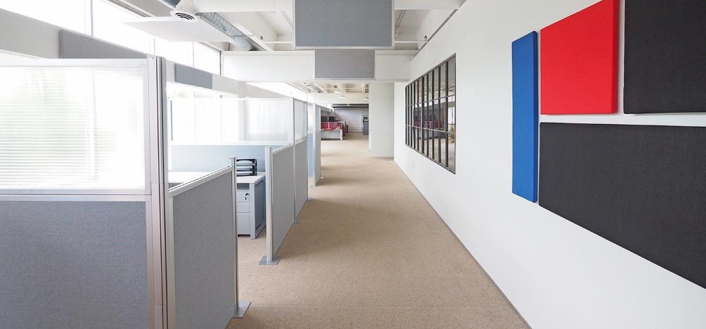 Hush acoustic cubicles configured in an open-plan space
