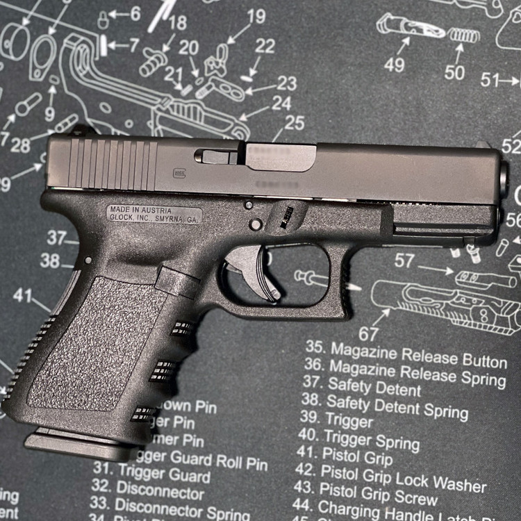 Gen 3 Glock 19 right side on tec mat featured at CM Ammo in Simi Valley, CA