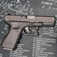 Gen 3 Glock 19 right side on tec mat featured at CM Ammo in Simi Valley, CA